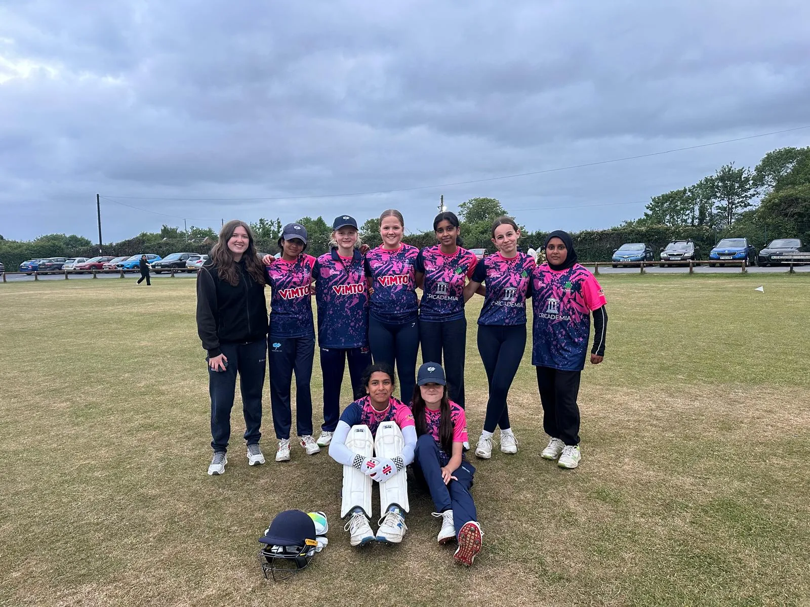 A Cricademia junior team together after a match