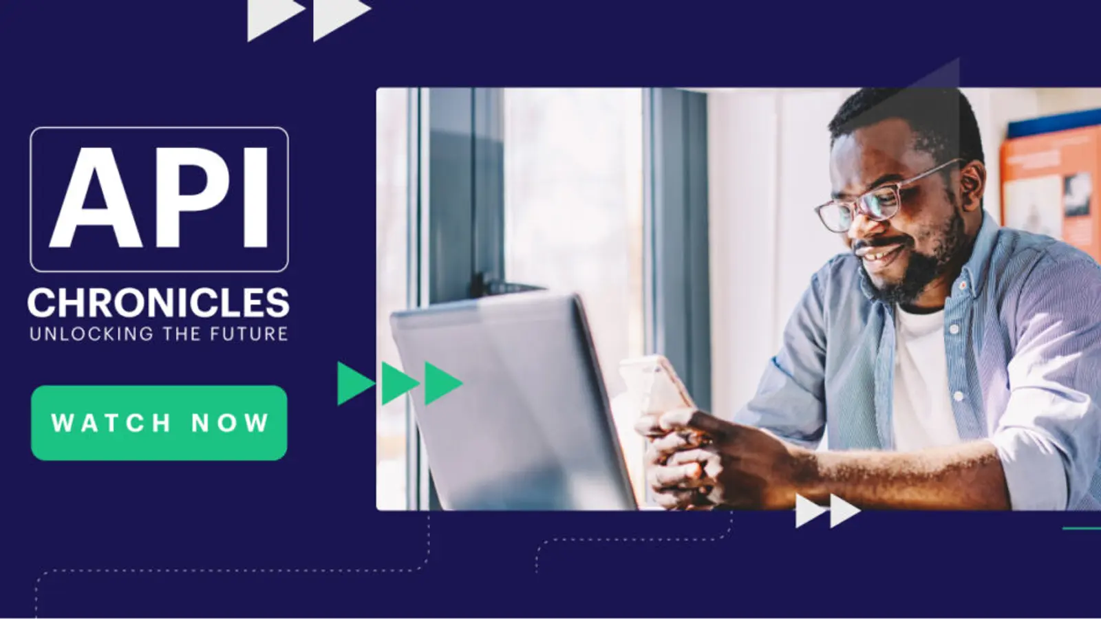 "API CHRONICLES UNLOCKING THE FUTURE" title, with a smiling Black man looking at his phone, a laptop nearby, and a "WATCH NOW" button.