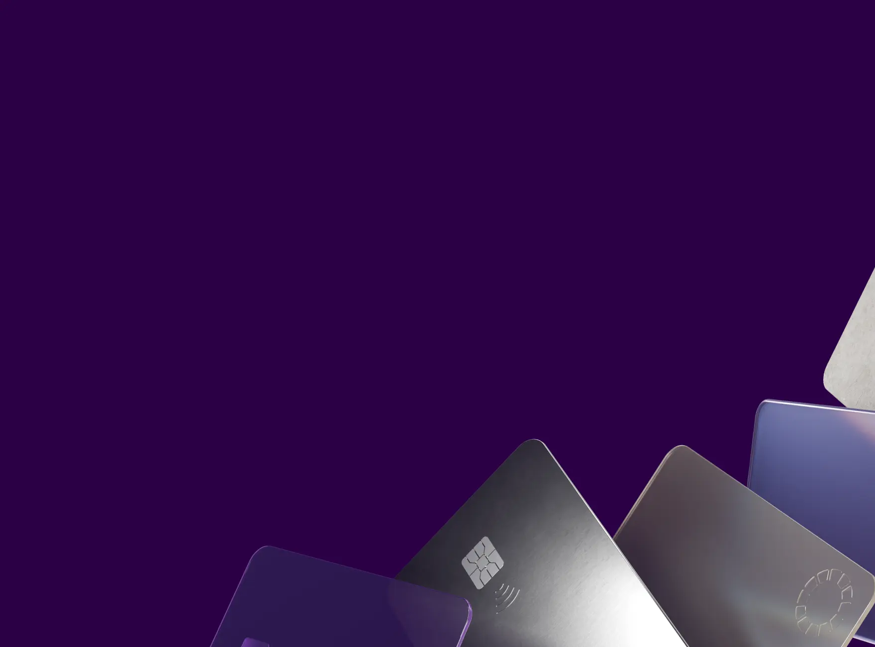 Overlapping metallic and purple credit cards on a dark purple background.