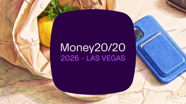 Illustrated text "Money20/20 2026 Las Vegas" over a grocery bag with produce and a smartphone with a wallet.