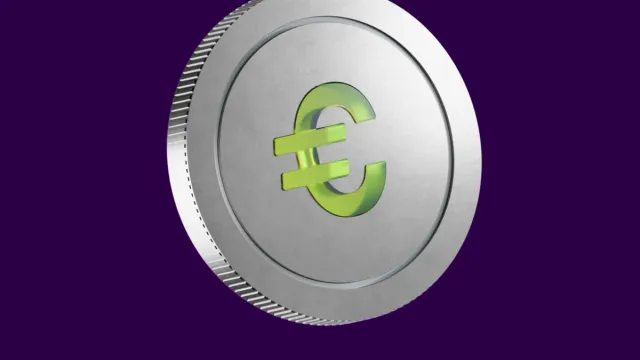 Silver coin with green Euro symbol on purple background.