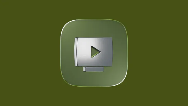 A 3D silver monitor icon with a play button on the screen, set within a green, rounded square.