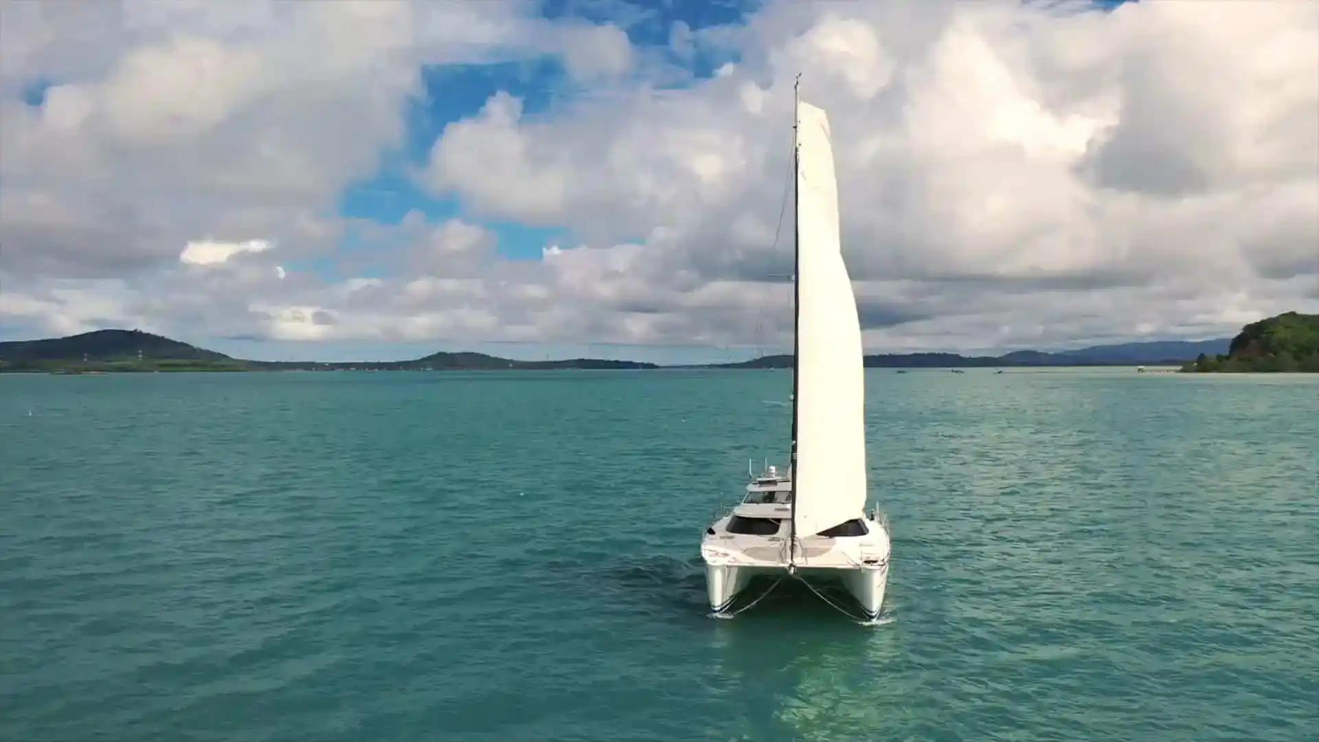 Antares catamaran sailing in open water with a wide bluewater profile