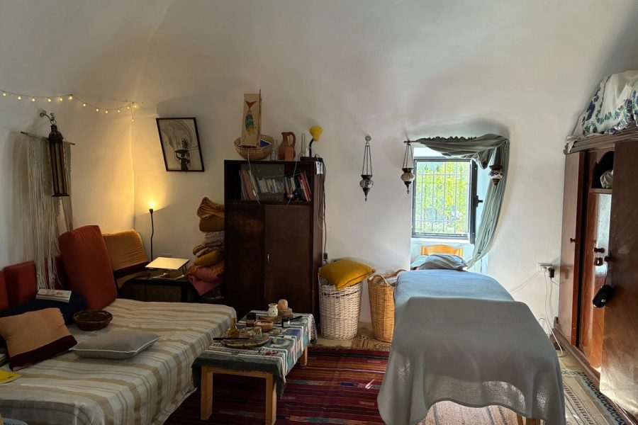 The treatment room, soft light and warm textiles