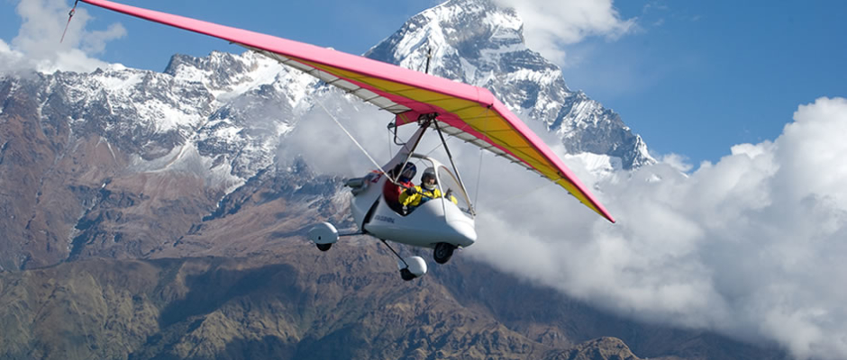 glider in the foreground, fishtail mountain in the background