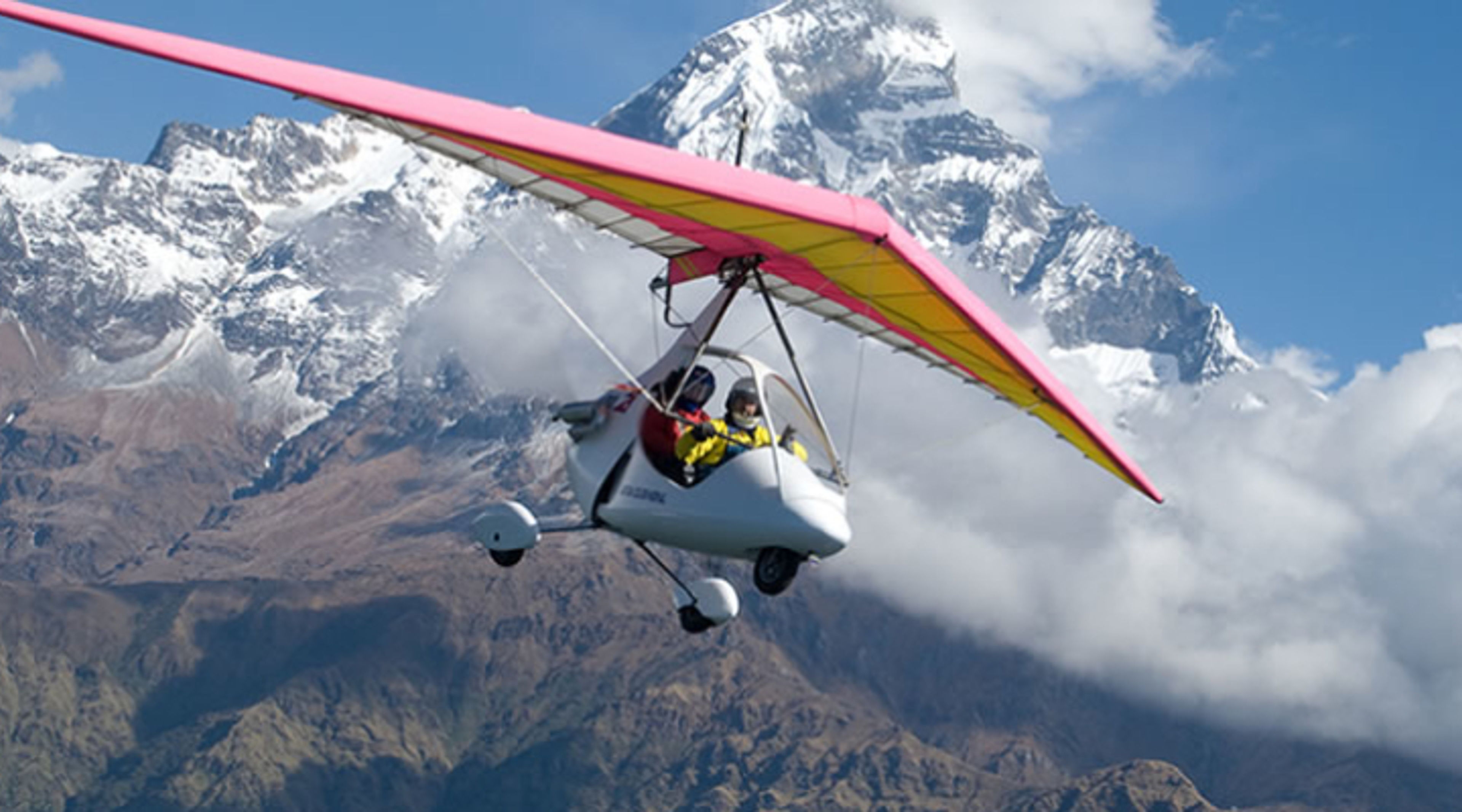 glider in the foreground, fishtail mountain in the background