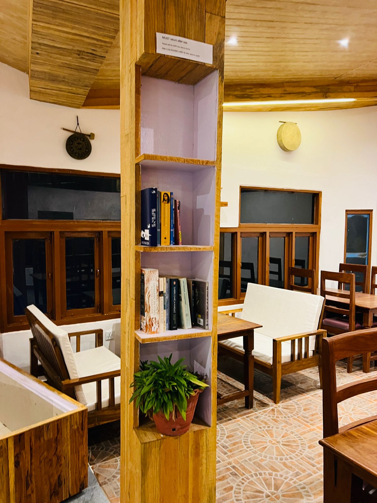 Shelf of books in the dining room