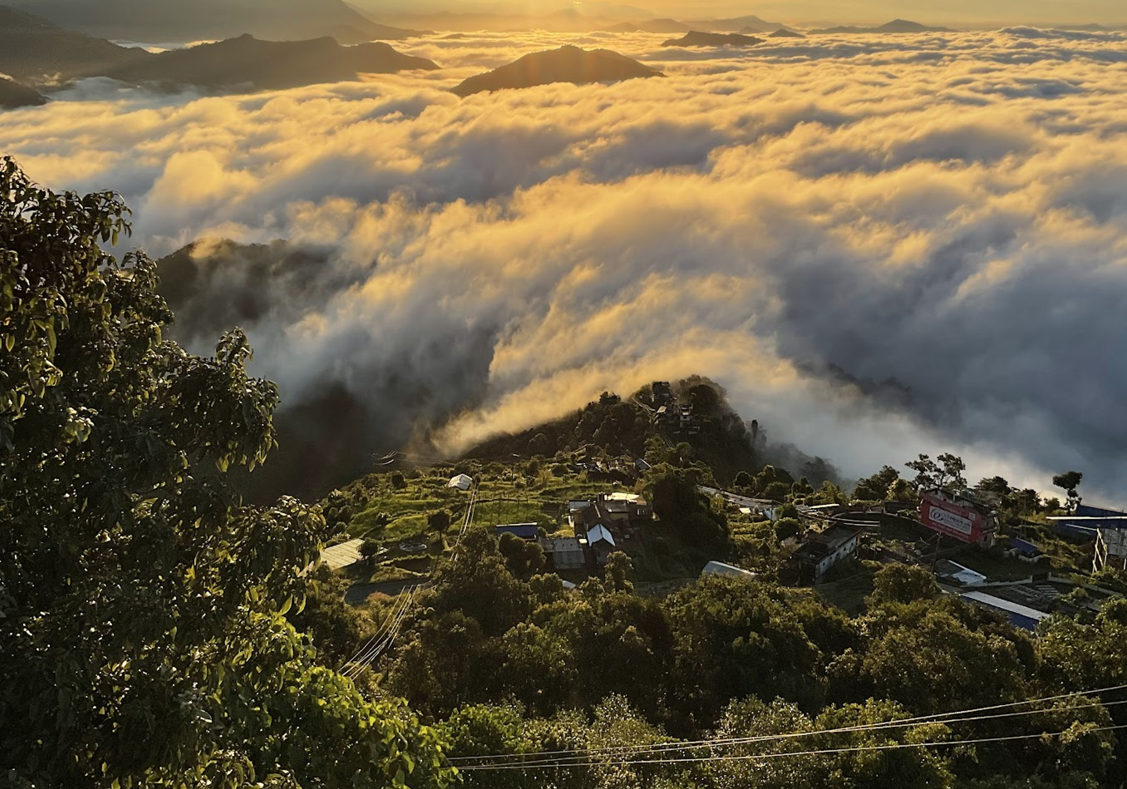 Sunrise over a sea of clouds, seen from Sarangkot