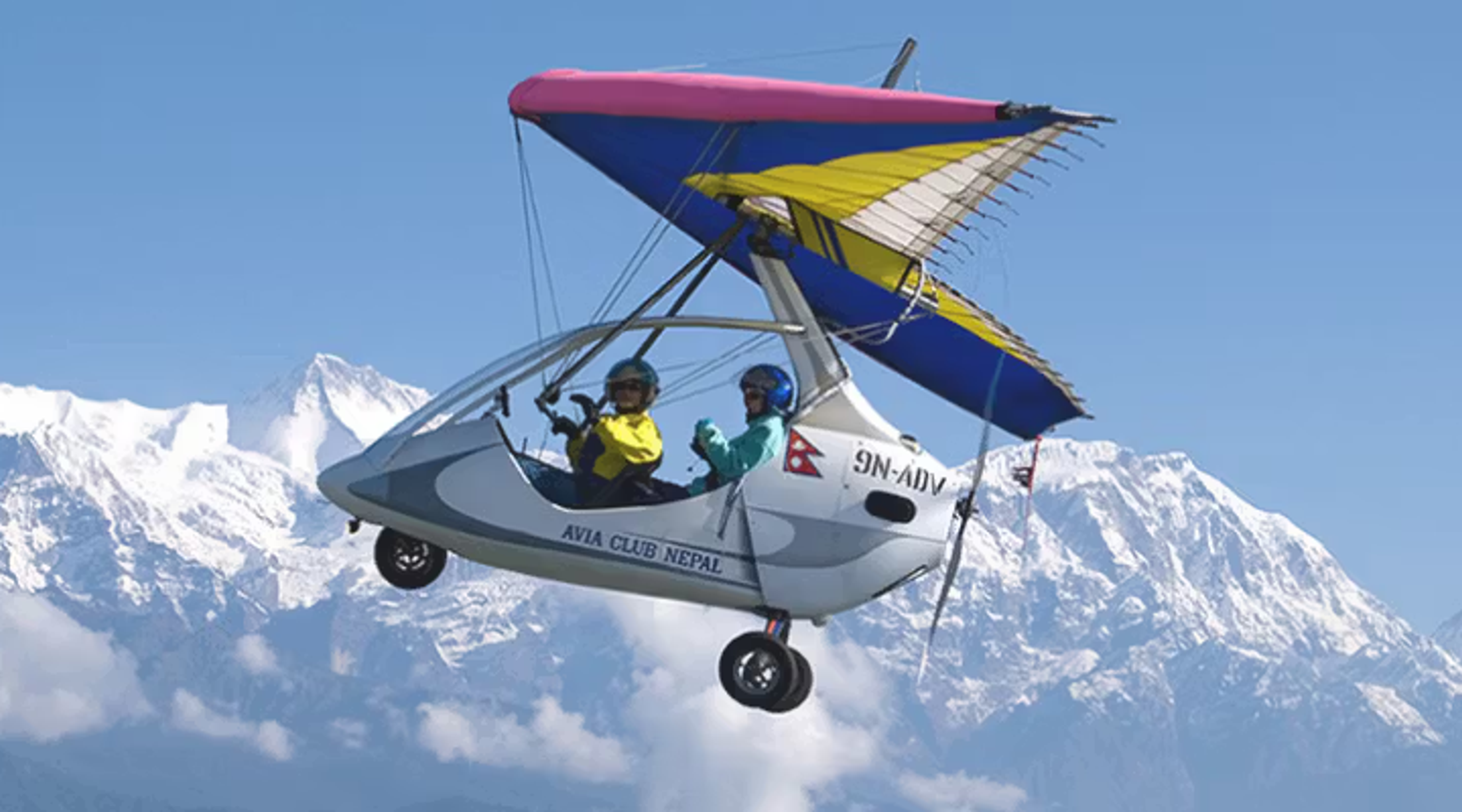 glider in the foreground, mountain in the background