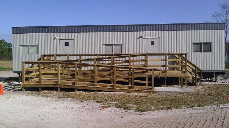 ADA accessible ramp after photo: the completed ramp with accessible parking, view 1 of 4