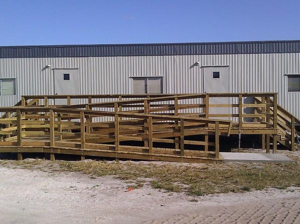 ADA accessible ramp after photo: the completed ramp with accessible parking, view 1 of 4