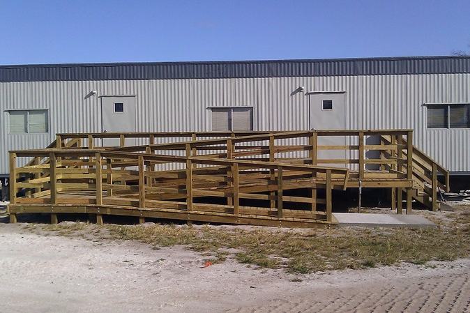 ADA accessible ramp after photo: the completed ramp with accessible parking, view 1 of 4
