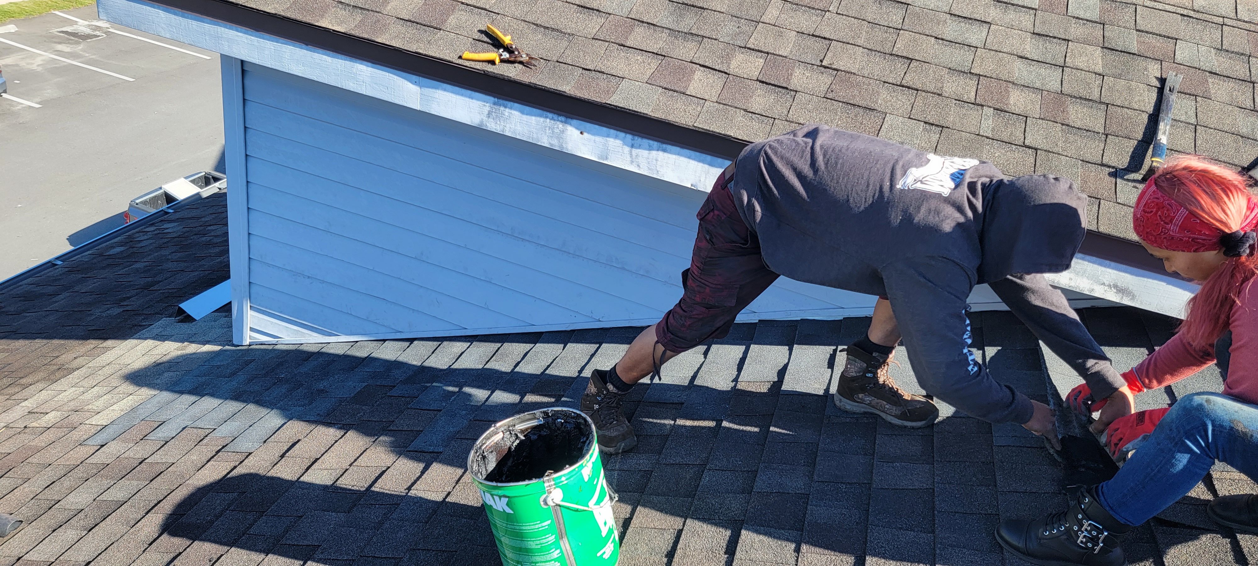 Progress of residential shingle repair