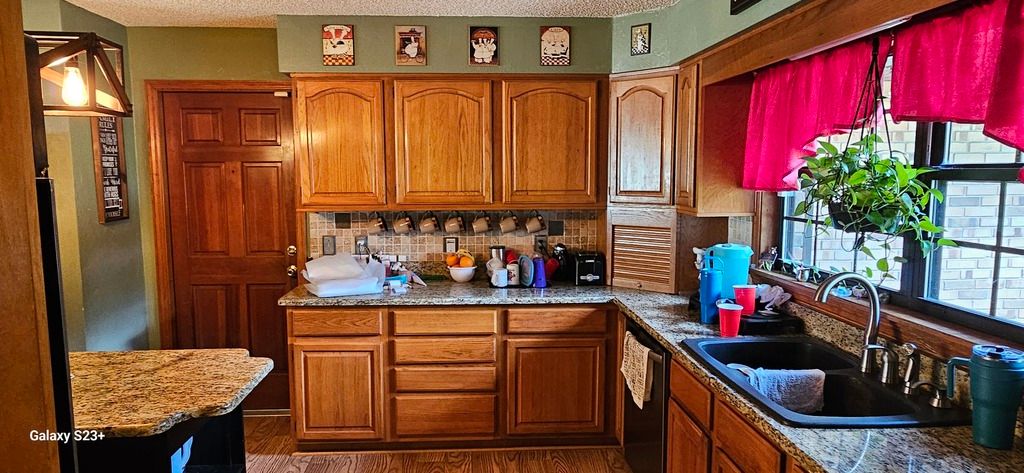 Kitchen remodel before photo: the original kitchen as it appeared before the remodel began, view 1 of 2