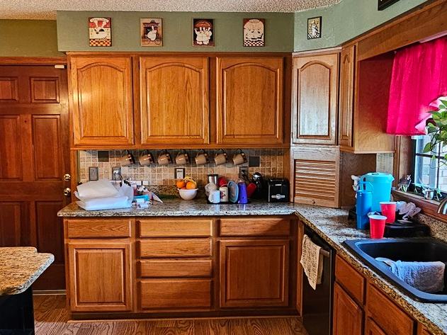 Kitchen remodel before photo: the original kitchen as it appeared before the remodel began, view 1 of 2