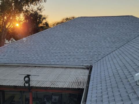 Re-roof after photo: completed roof replacement with the new roof surface installed, view 1 of 4