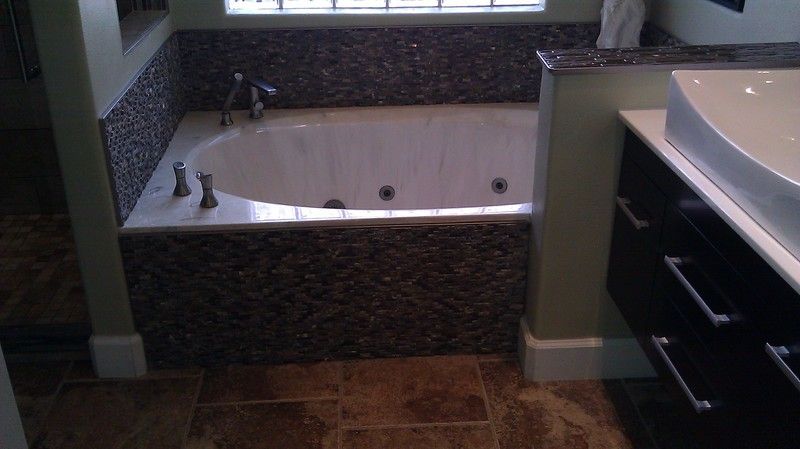 Bathroom tub replacement after photo: the new tub installed and finished in the bathroom