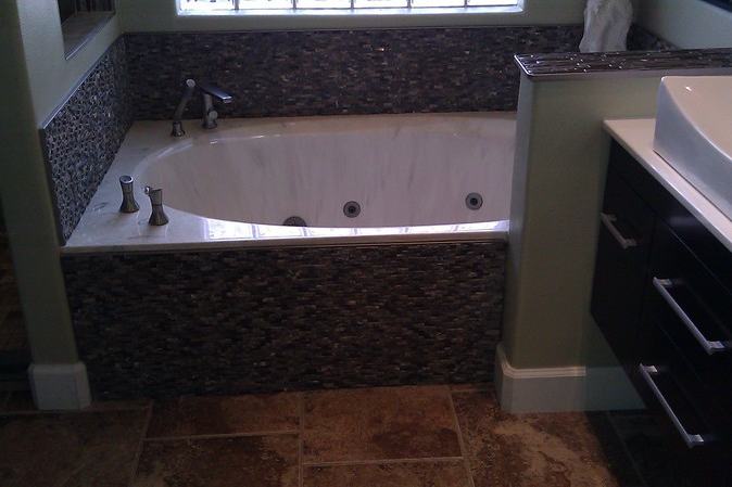 Bathroom tub replacement after photo: the new tub installed and finished in the bathroom