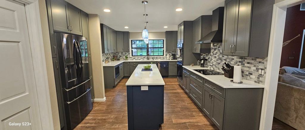 Kitchen remodel after photo: the remodeled kitchen finished and ready for use, view 1 of 2