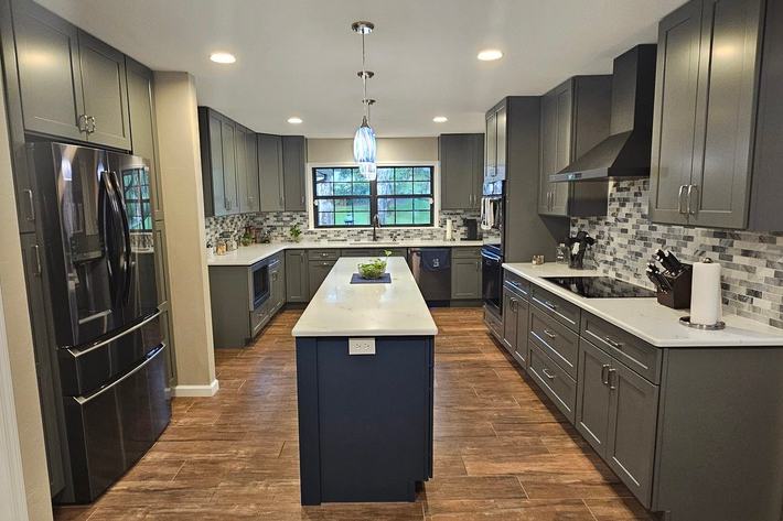 Kitchen remodel after photo: the remodeled kitchen finished and ready for use, view 1 of 2