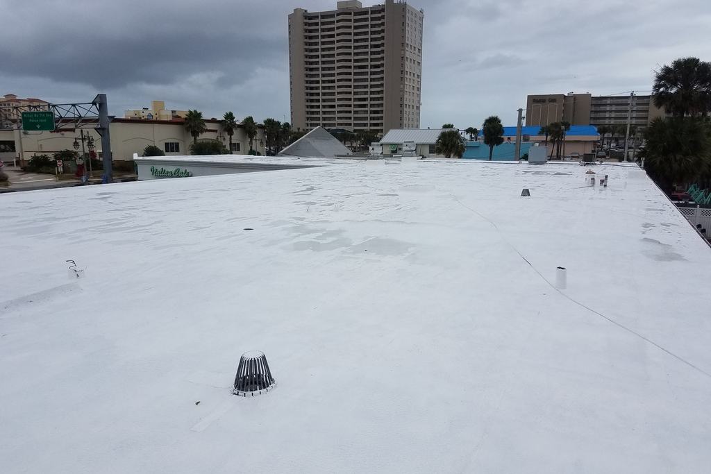 Silicone recovery system roof after photo: the flat roof finished with the new silicone coating, view 1 of 2