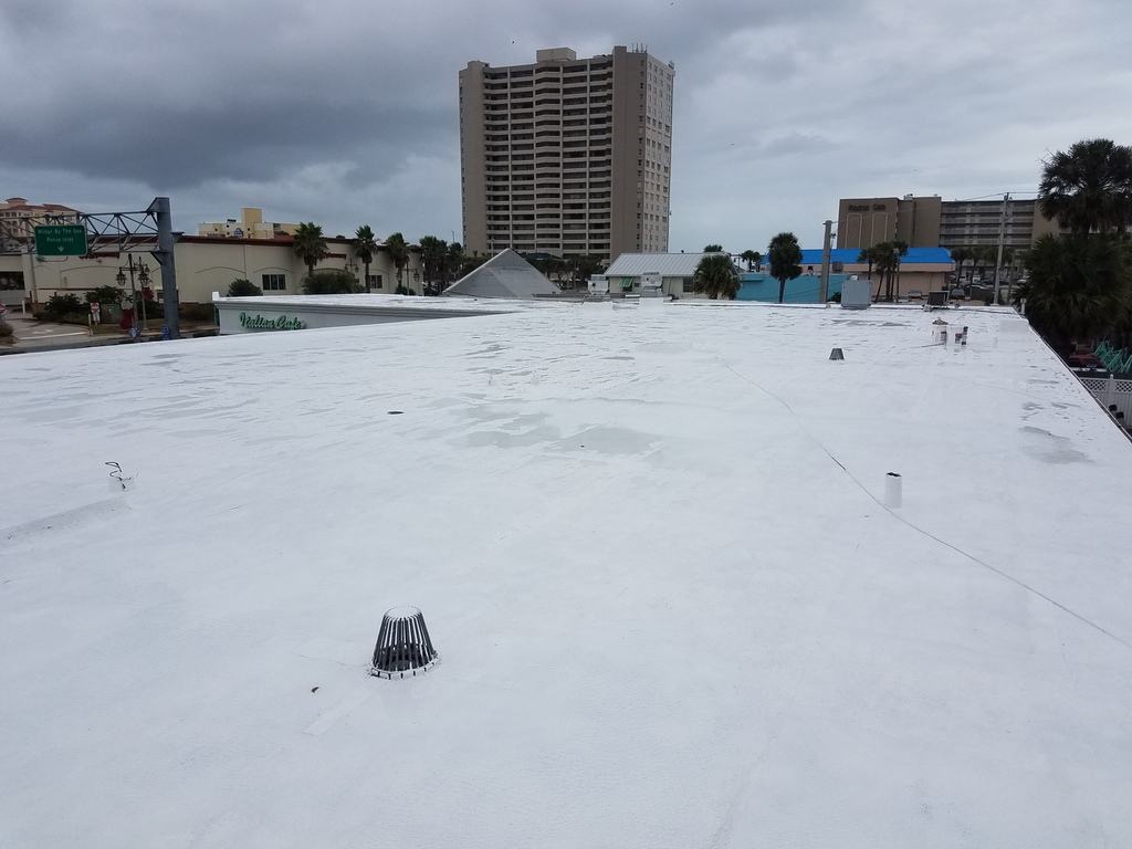 Silicone recovery system roof after photo: the flat roof finished with the new silicone coating, view 1 of 2