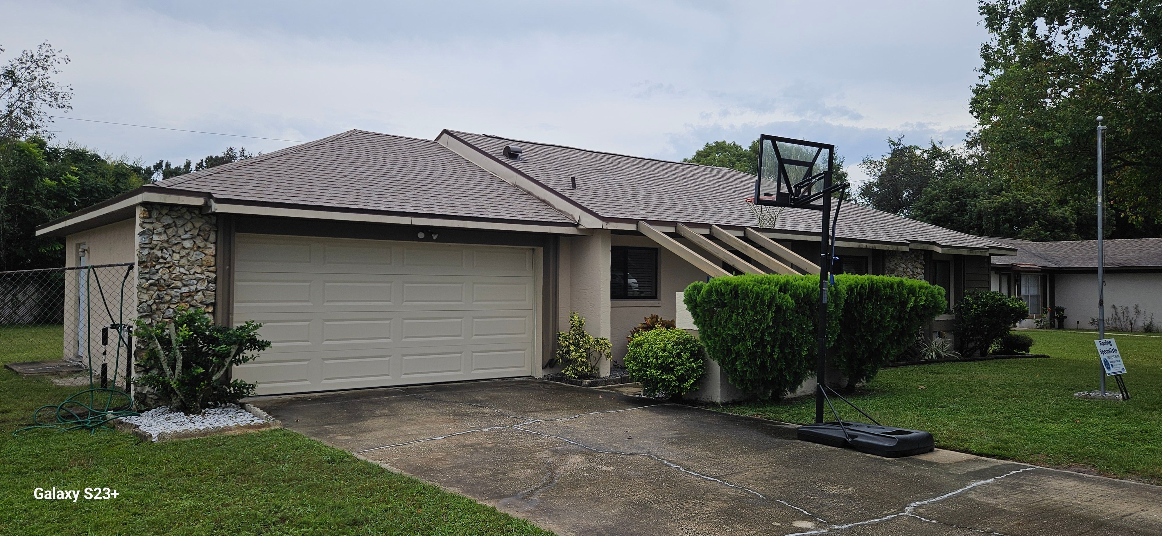 Re-roof after photo: completed roof replacement with the new roof surface installed, view 2 of 4