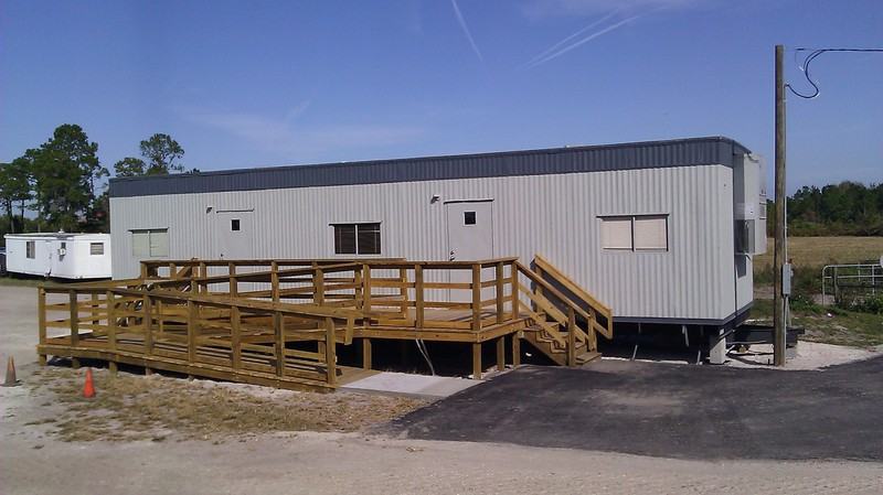 ADA accessible ramp after photo: the completed ramp with accessible parking, view 2 of 4