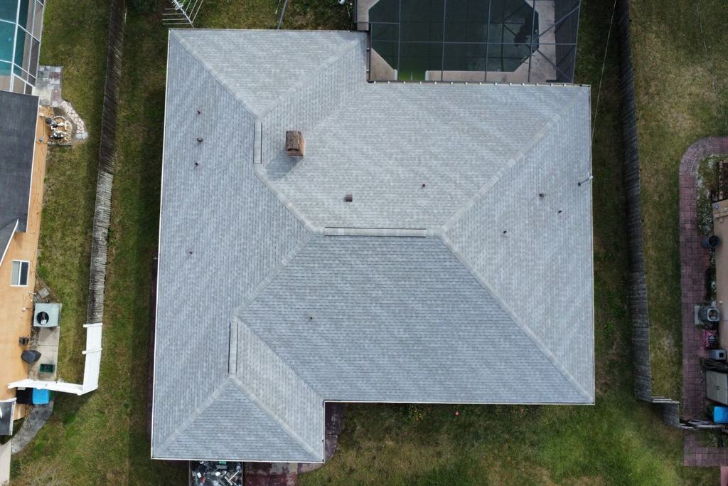 Re-roof after photo: completed roof replacement with the new roof surface installed, view 1 of 4