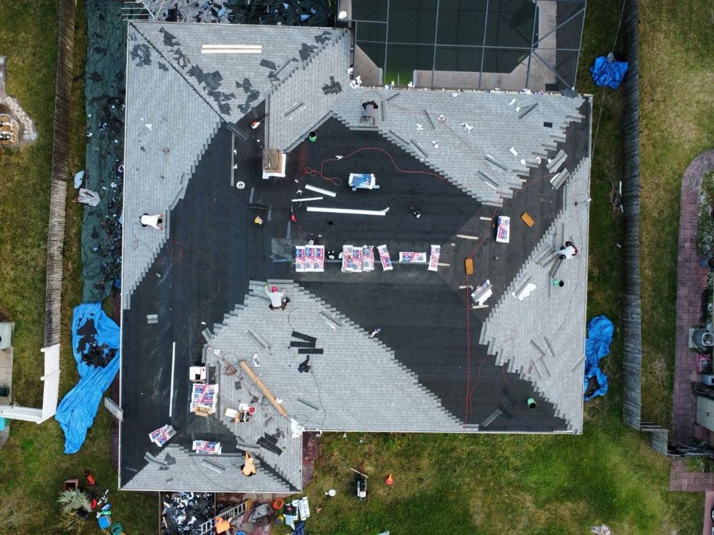 Re-roof process photo: the roof surface as it appeared during the tear-off process