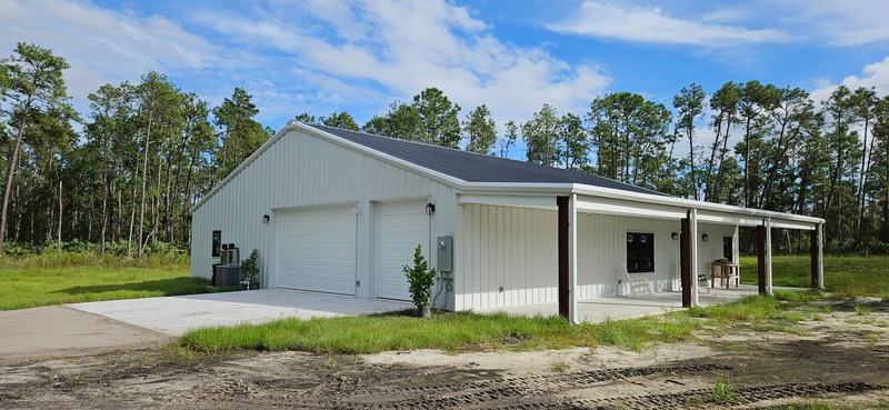 Barndominium new build exterior photo: the finished exterior of the completed barndominium, view 2 of 2