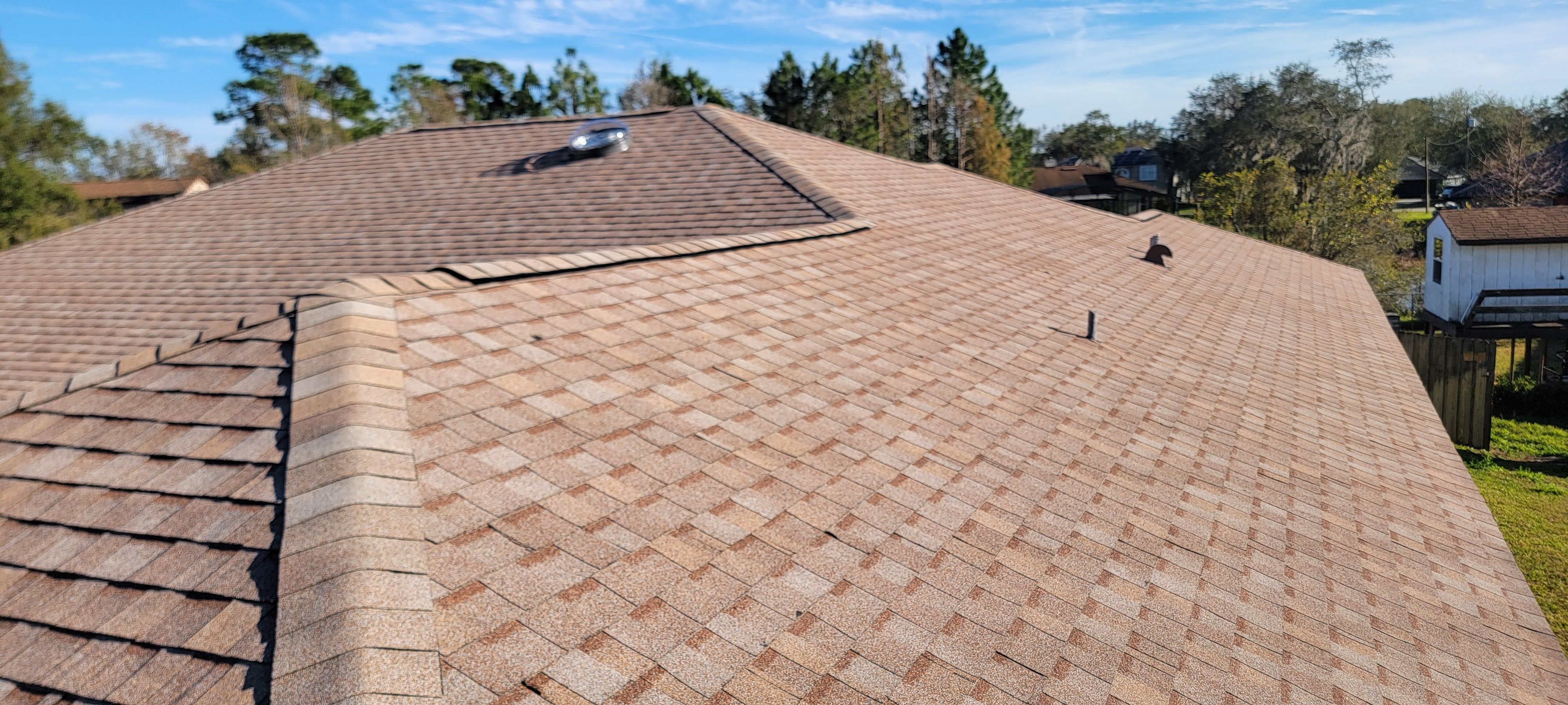 Re-roof after photo: completed roof replacement with the new roof surface installed, view 3 of 4