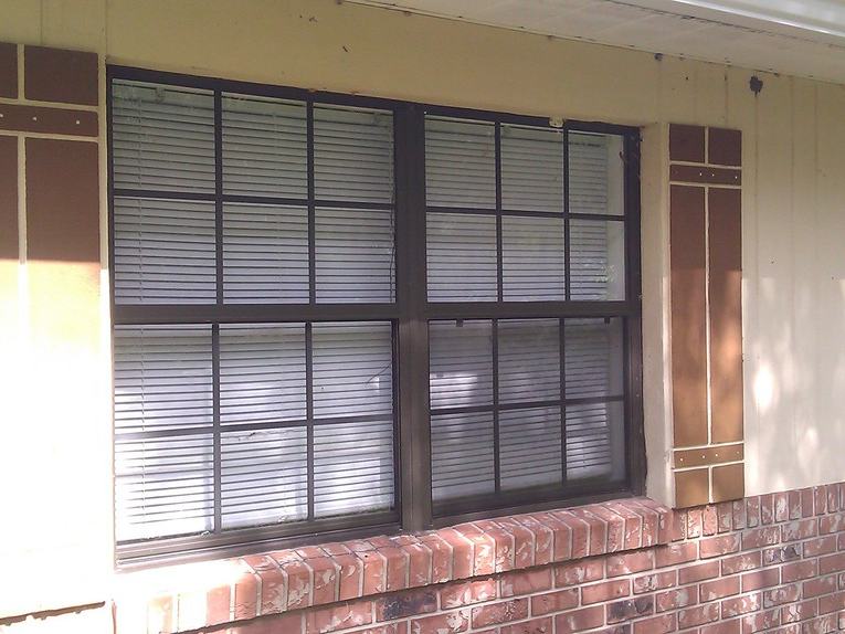 Window replacement before photo: the original windows before they were replaced, view 2 of 2