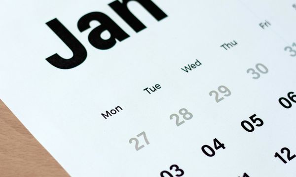 Close-up of a printed January calendar page, the month Indonesian agencies publish their annual procurement plan on SIRUP