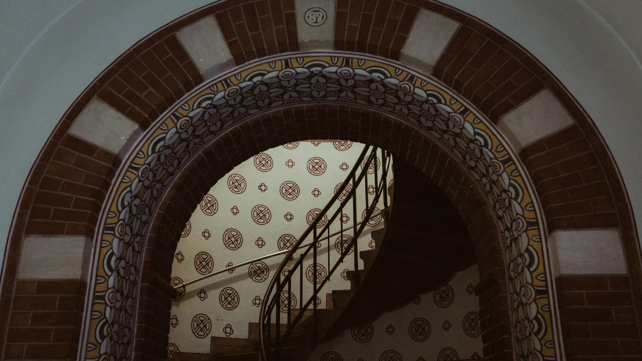An arched staircase inside Copenhagen City Hall.