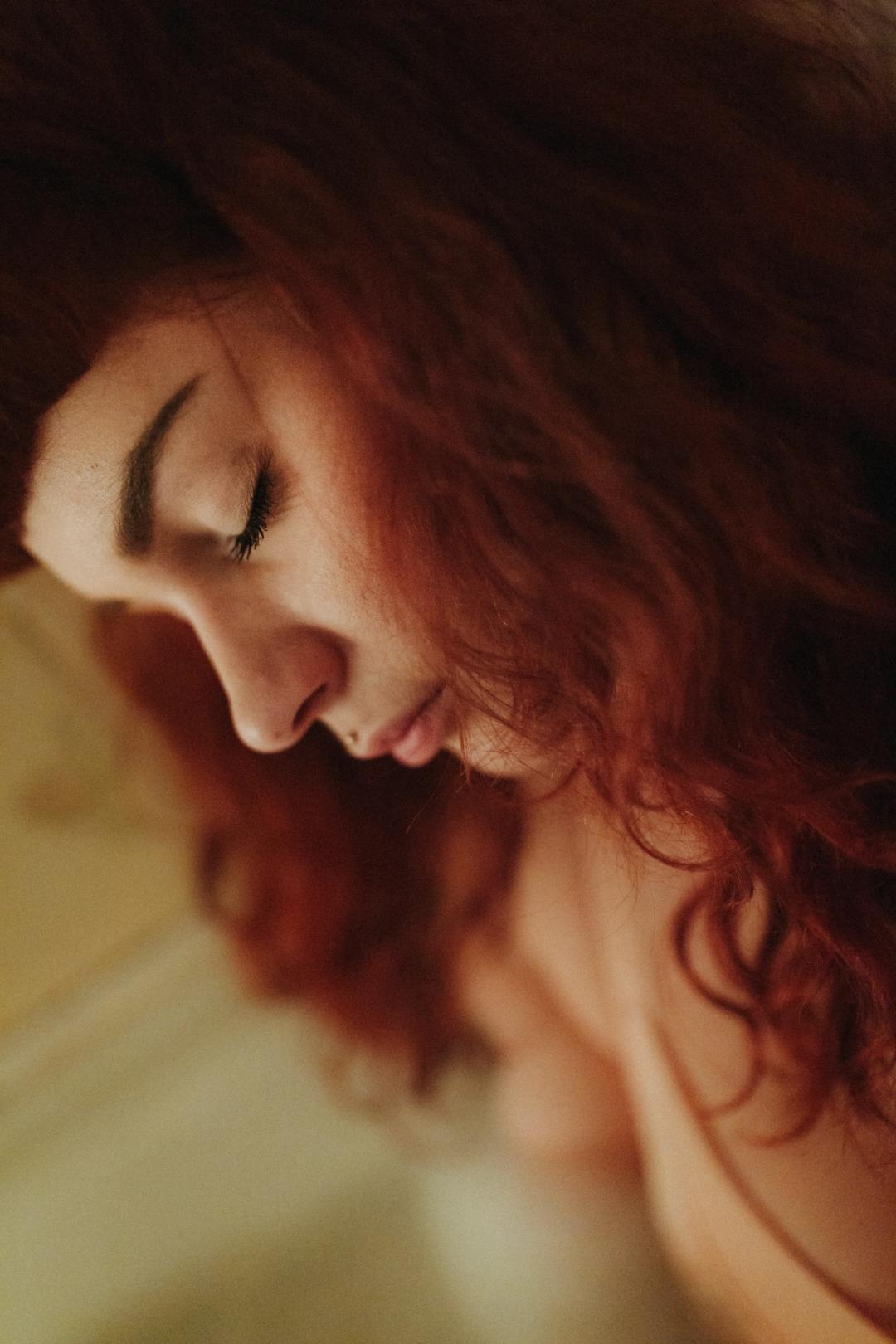 Laura resting in warm window light