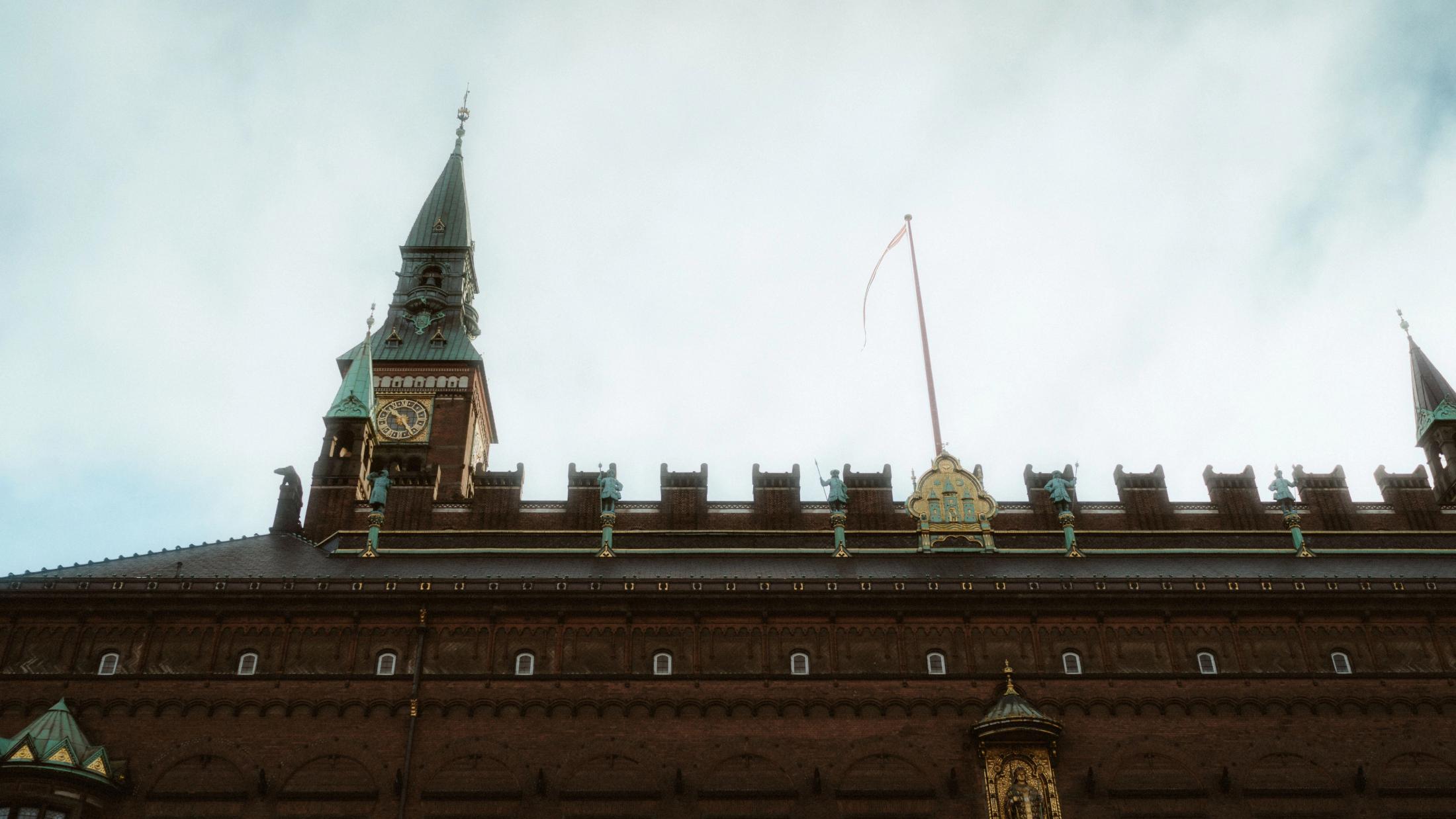 Copenhagen City Hall beneath a pale winter sky