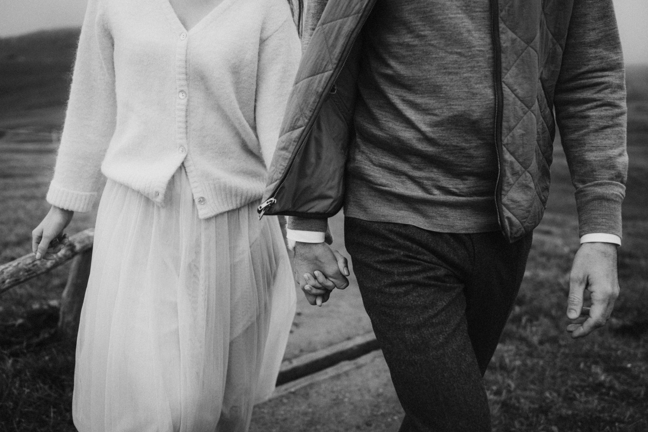 Close view of Jana and Steffen holding hands while walking.