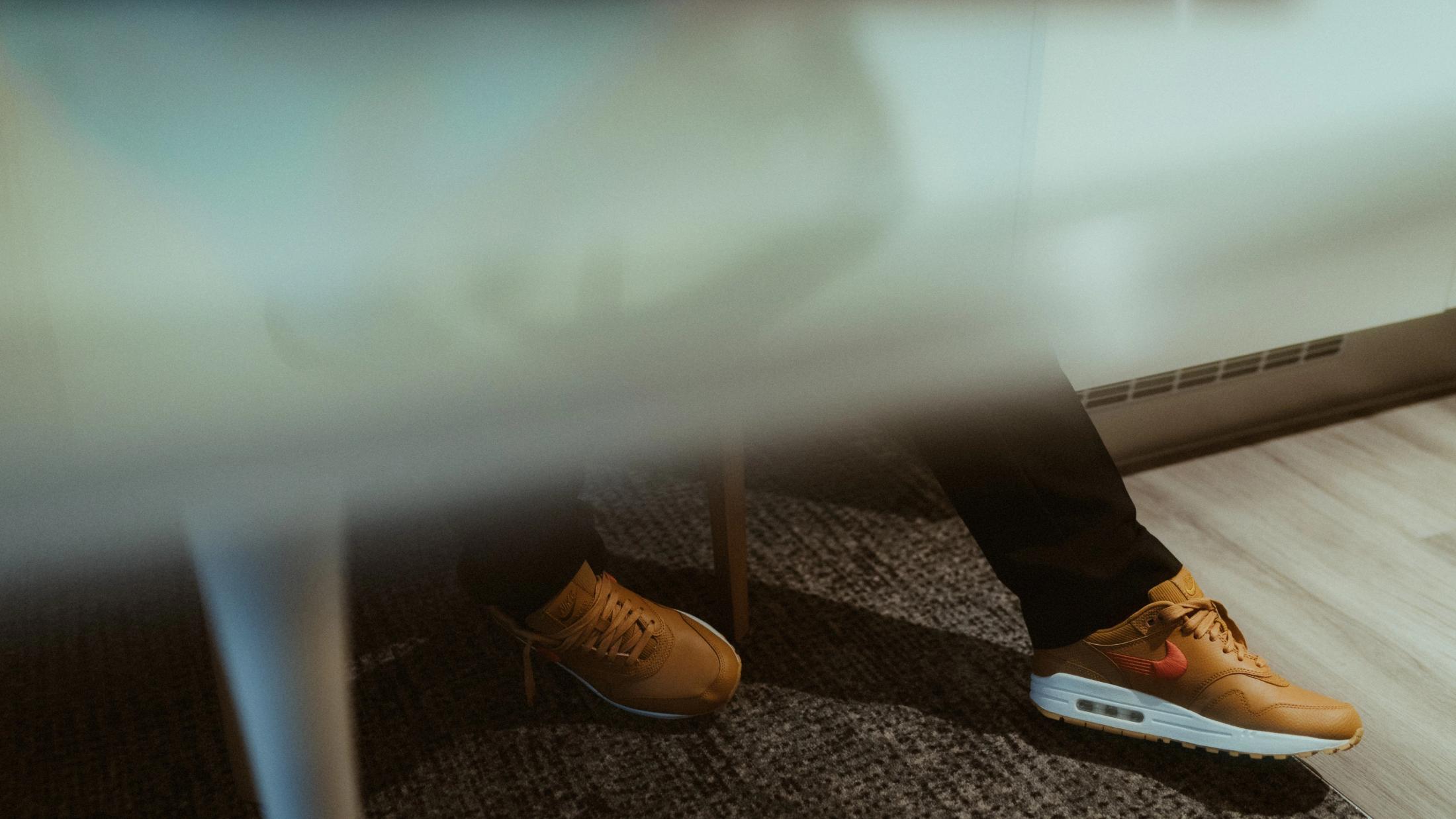 Wedding shoes seen through a layered reflection