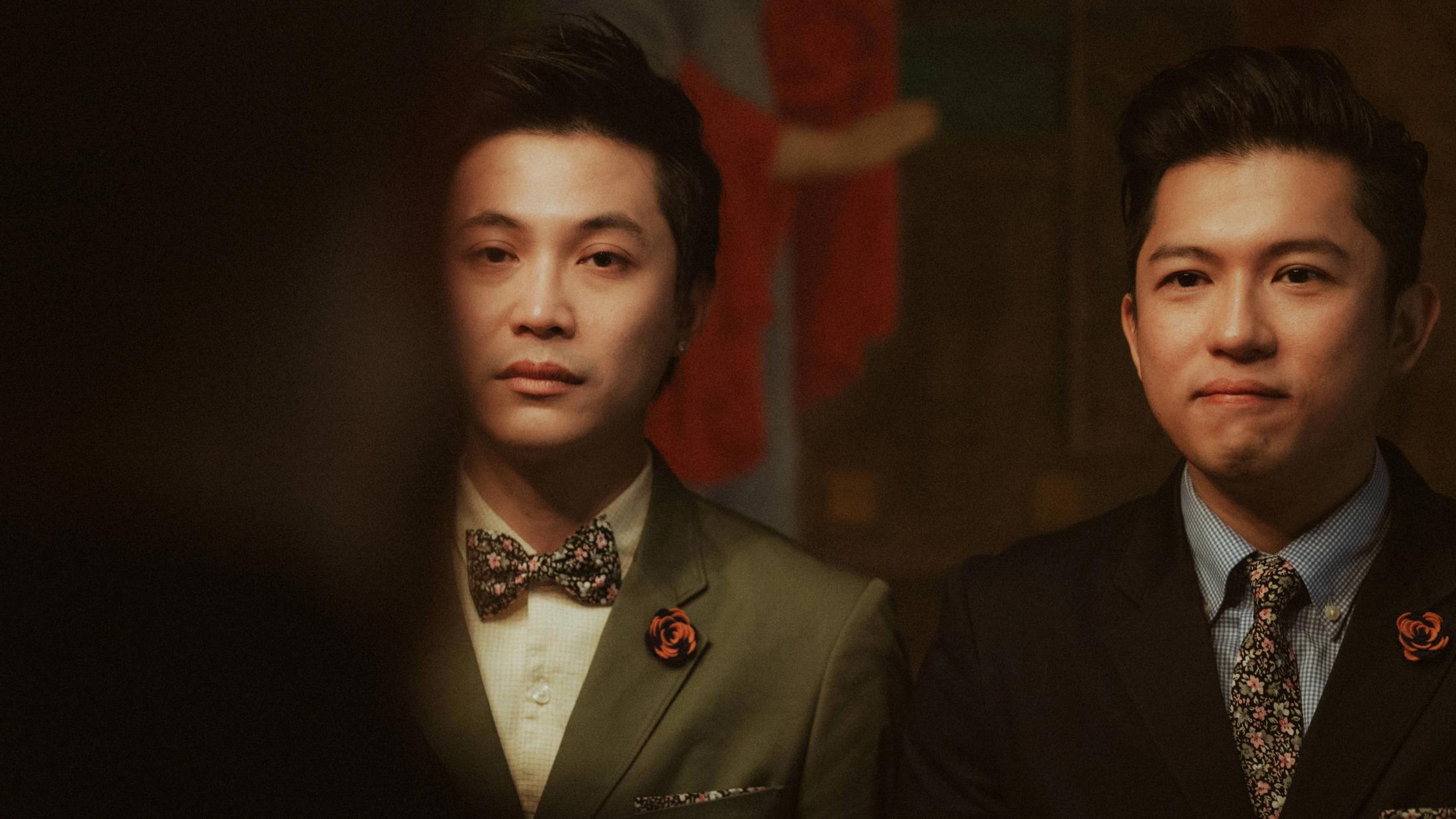 Individual portraits of Kevin and Terence in their wedding suits.