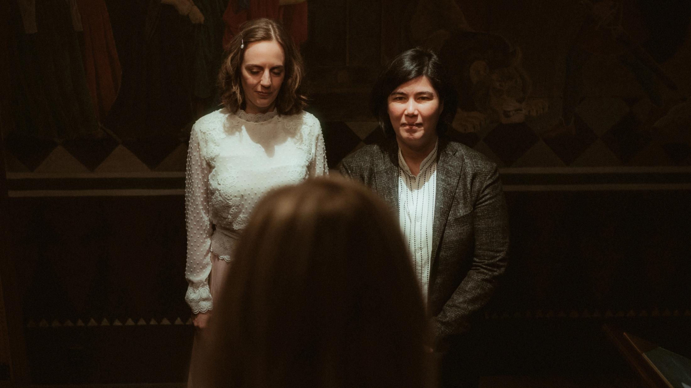 Ari and Pia facing the registrar during their civil ceremony
