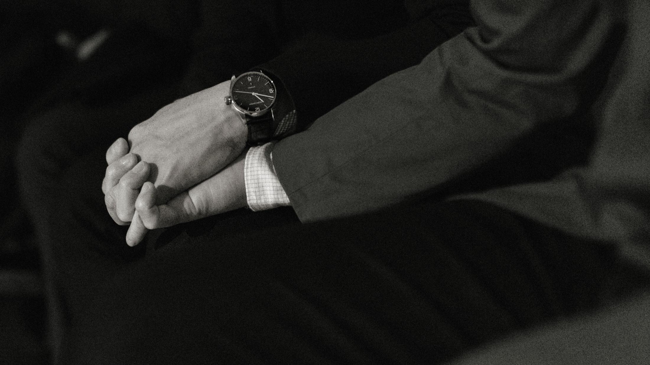 Couple's nervous hands while waiting before their Copenhagen City Hall ceremony