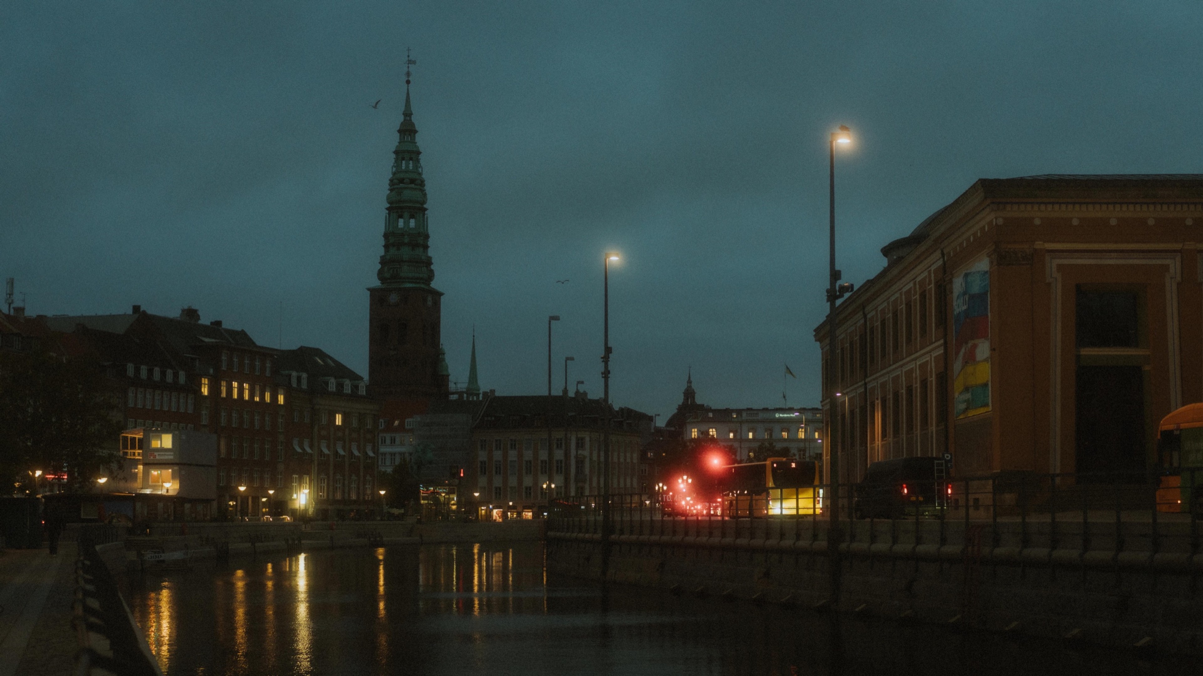 Copenhagen canal and city skyline at blue hour