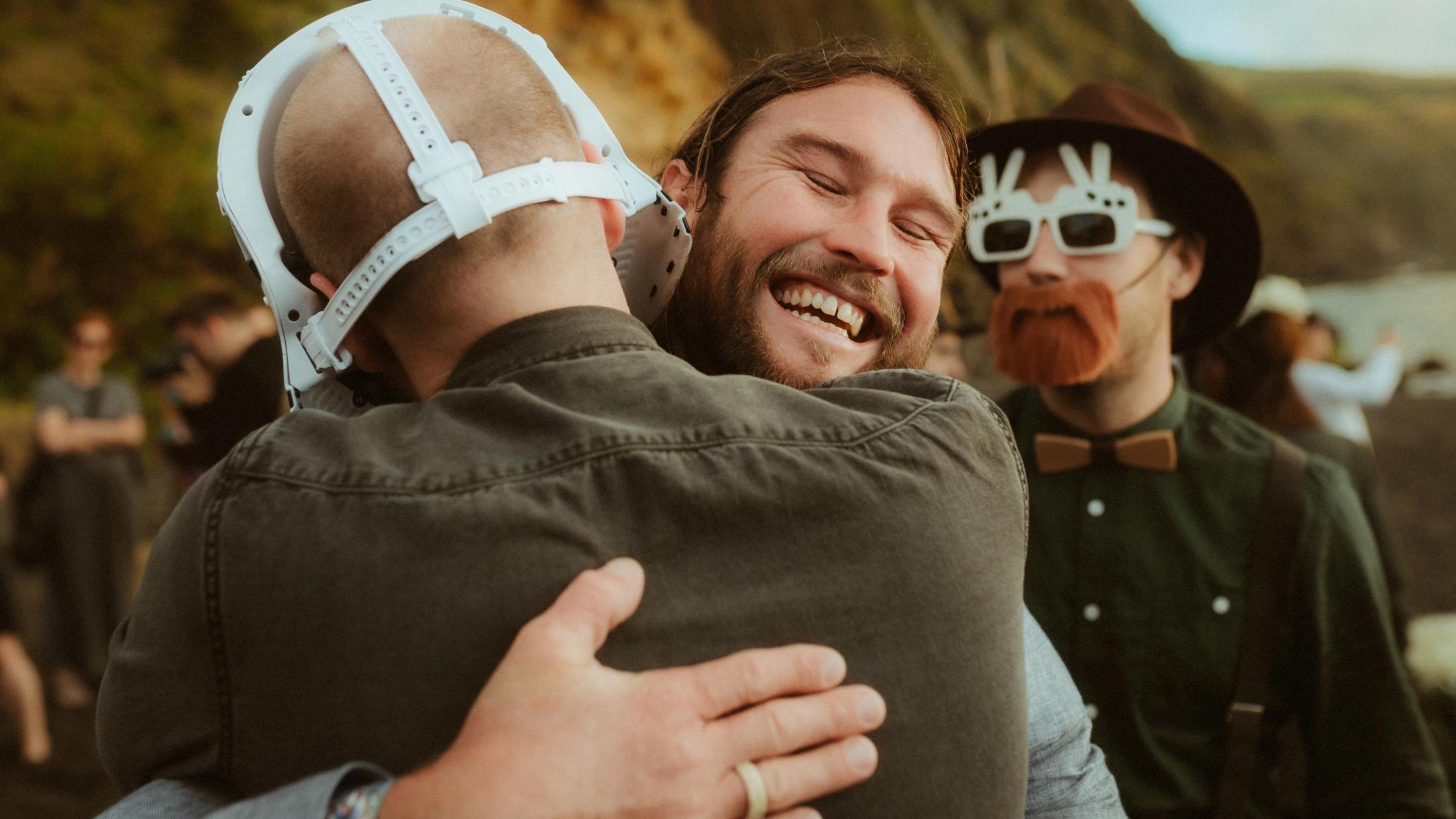 Gary laughs while greeting a guest after the ceremony.