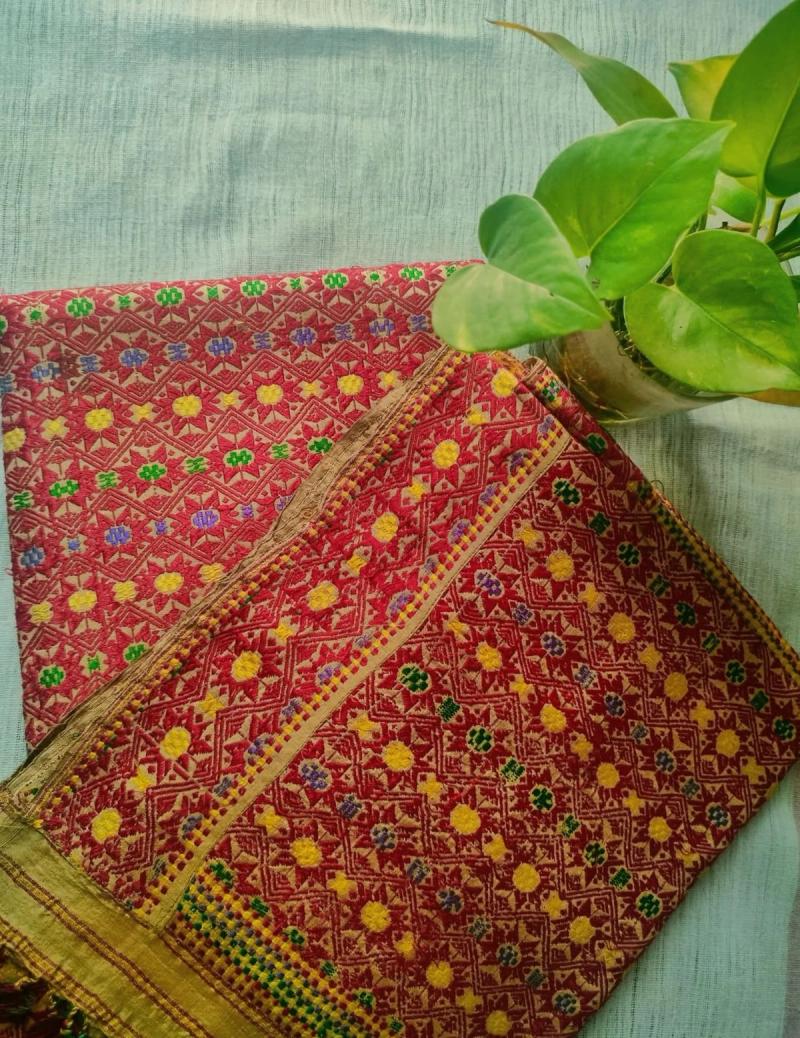 An Assamese Muga silk Sador Mekhela with figural woven motifs