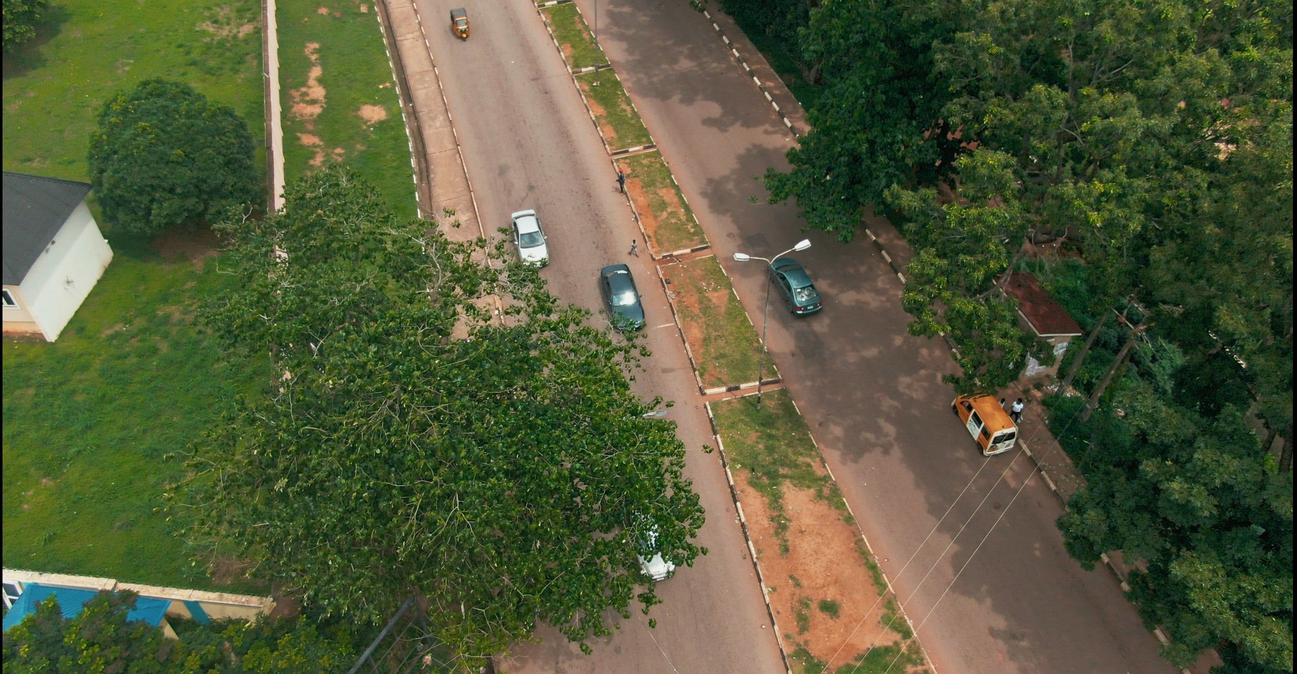 Aerial view of a dual carriageway through green countryside