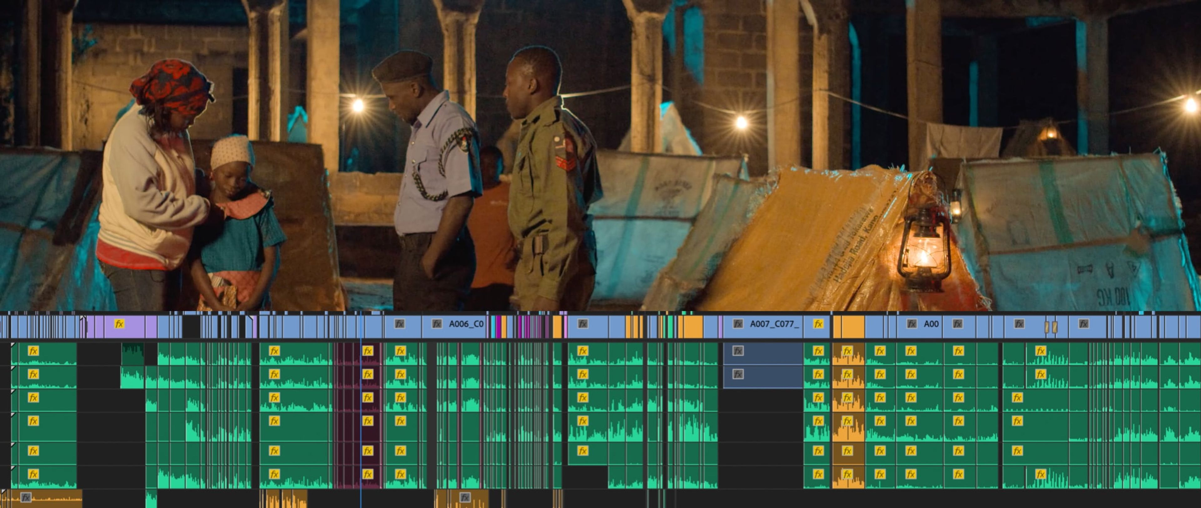 Night market scene above an editing timeline