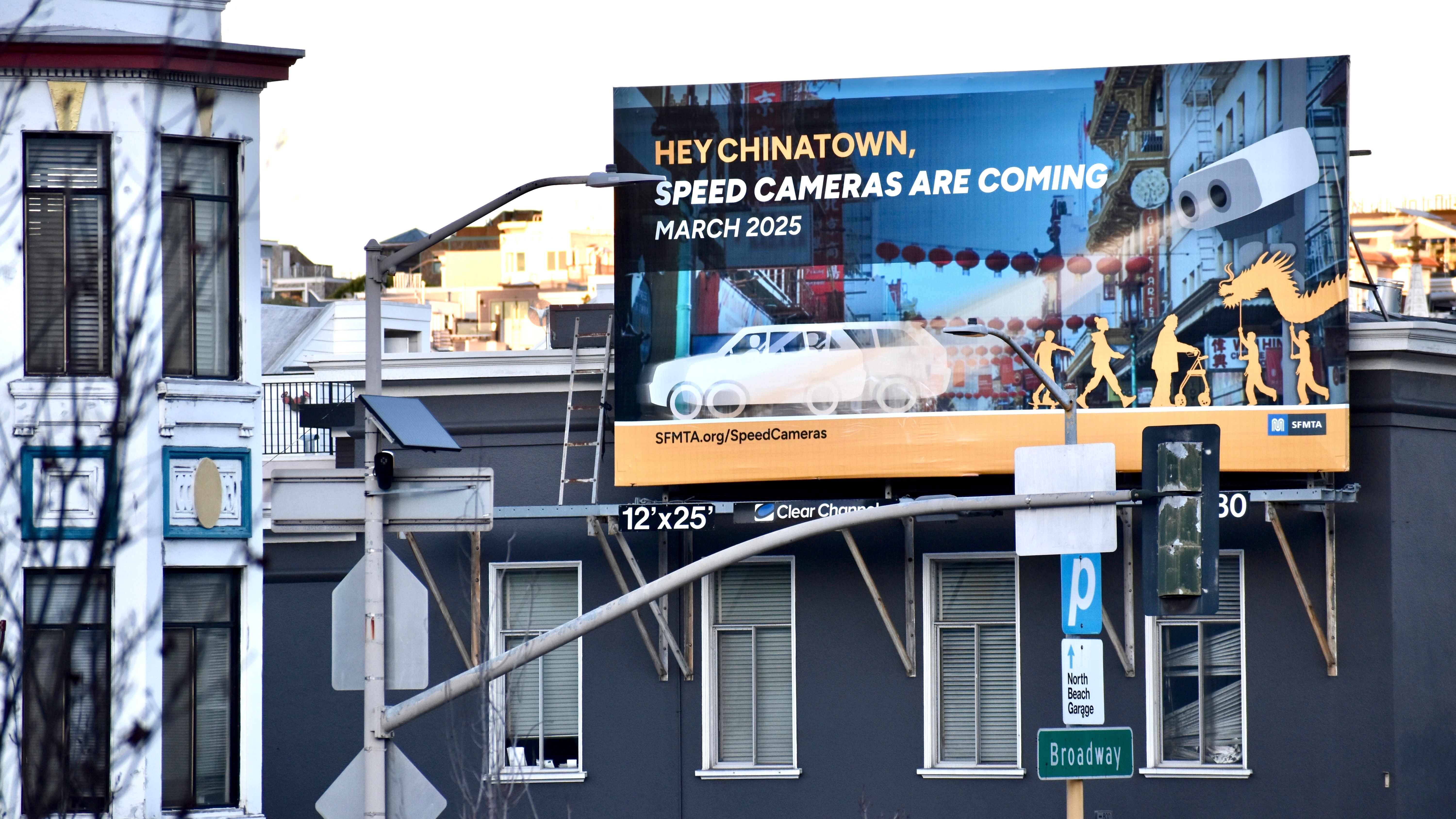 The Broadway segment between Powell and Stockton Streets is the only one of 33 locations in San Francisco Chinatown to be equipped with the advance automated speed cameras. A big billboard from SFMTA is seen at the intersection of Broadway and Powell Streets in Chinatown to alert drivers. Photo by Portia Li