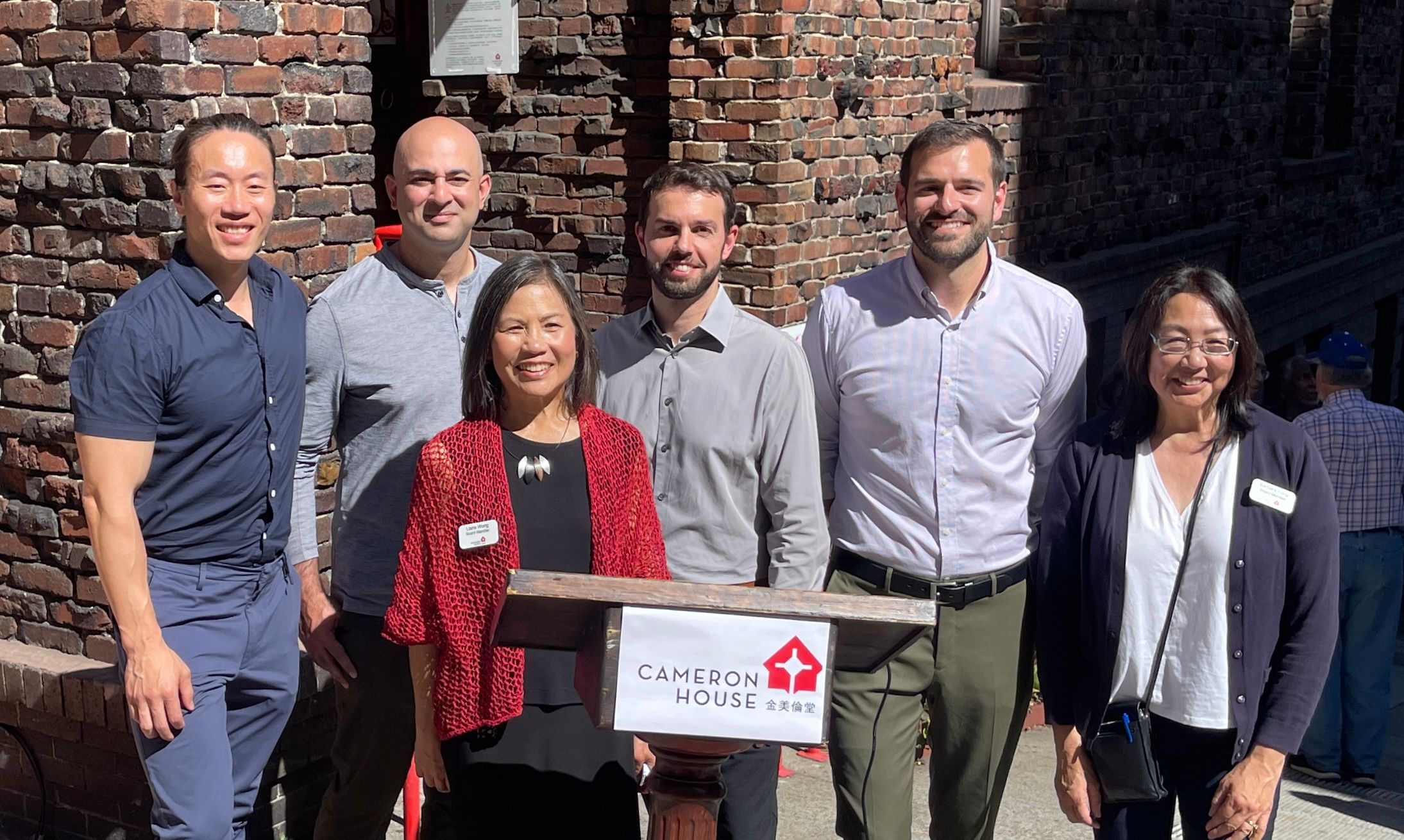 Tech leaders, Jason Shen (from far left in back row), Bilal Mahmood, John Jersin, Danny Sauter, announce a fundraiser to build a new computer lab for the Cameron House in Chinatown. Photo by Portia Li