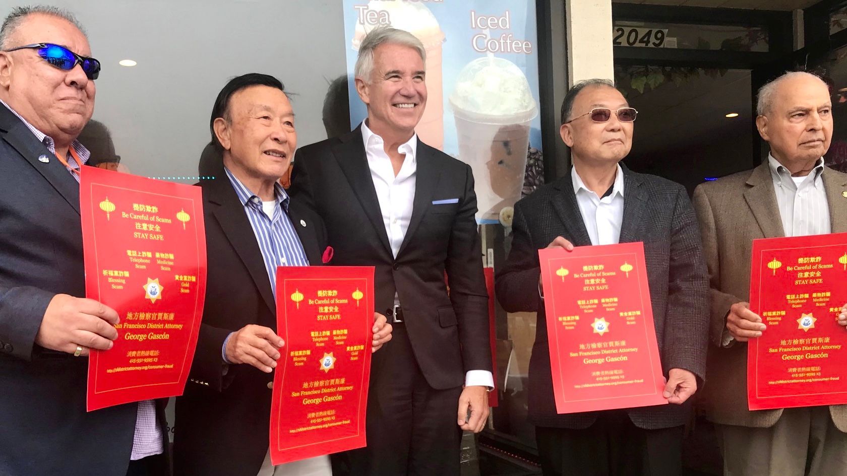 Former District Attorney George Gascon (center) walks the merchants with Benny Yee (second from left) to promote public safety in the Sunset District. Photo by Portia Li